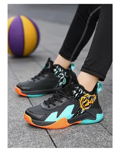 Detail view of boys' high-top basketball sneakers with colorful splatter design