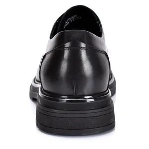 Close-up back view of men's genuine black leather Oxford shoes with a classic round toe.