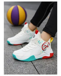 Detail shot of children's white basketball shoes with No. 24 logo and colorful soles