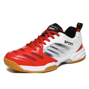 Detailed side view of a red and white professional indoor court sports shoe for table tennis