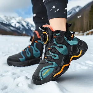 Boys' winter warm plush sneakers shown on a snow-covered ground with mountains
