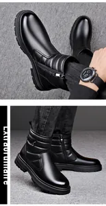 Vue détaillée de bottines d'hiver pour hommes en cuir noir avec fermeture éclair latérale.