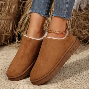 Cozy brown suede snow boots with white fur lining and thick platform sole