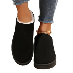 Cozy women's black snow boots with white faux fur lining and thick platform sole
