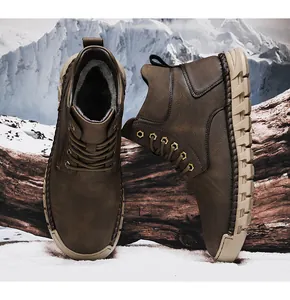 Detail view of brown men's outdoor boots with warm fleece lining and hand-sewn stitching