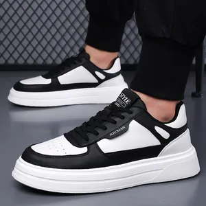 Sneakers da uomo alla moda in bianco e nero con suole spesse antiscivolo e tomaia in pelle