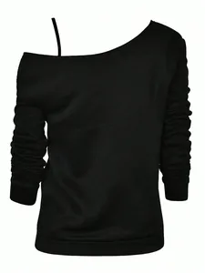 Macro detail view of a black long-sleeved off-the-shoulder top with side strap accent