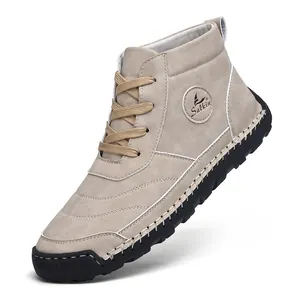 Detailed view of men's high-top khaki suede Martin boots with hand-stitched sole