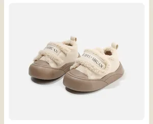 Cozy baby winter walking shoes with warm faux fur lining and thick brown non-slip soles