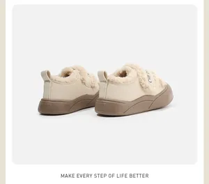 Rear view of beige children's winter cotton shoes featuring warm faux fur lining and thick soles.