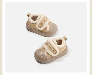 Close-up view of warm fleece-lined toddler winter shoes with secure Velcro straps