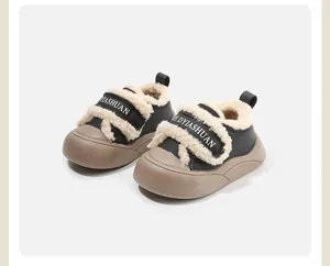 Detail view of warm baby winter shoes with fleece lining and thick khaki soles