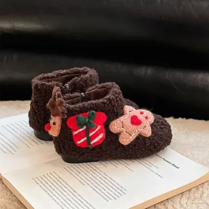 Botas de nieve navideñas de sherpa marrón para niños con diseño de reno