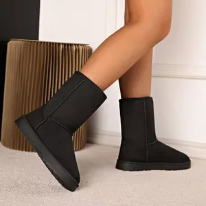 Women's black high-top snow boots with warm faux fur lining and thick sole
