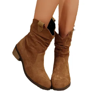 Bottes de cow-boy vintage en daim marron à bout pointu et talons blocs épais