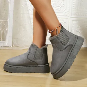 Grey platform snow boots for women with warm faux fur lining and elastic side panels