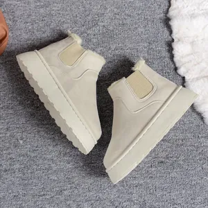 Top view of beige fleece-lined platform snow boots with elastic panels and thick sole