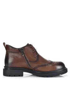 Side view detail of premium brown cowhide leather brogue boots featuring side zipper