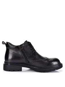 Detailed side view of black genuine cowhide leather men's Chelsea brogue boots with zipper