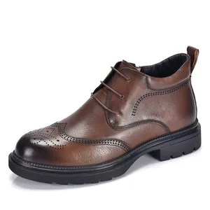 Premium brown genuine leather men's brogue boots featuring stylish wingtip detailing