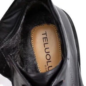 Men's cowhide leather Martin boots with warm fur lining and soft black upper for winter.