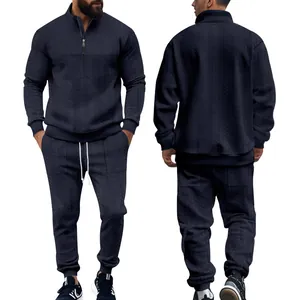 Vista frontal y trasera de un chándal de dos piezas de jacquard para hombre azul