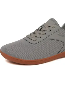 Chaussures de marche grises unisexes en flyknit avec semelle en caoutchouc marron