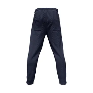 Vista posterior de pantalones de chándal azul marino con textura de jacquard trenzado
