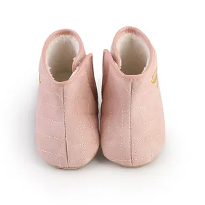 Soft pink quilted baby winter boots with warm faux fur lining for infants and toddlers