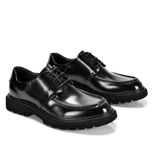 Detailed side view of premium black glossy leather derby shoes with thick lug soles