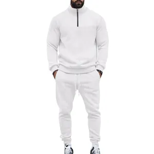 Men's white jacquard tracksuit set featuring a half-zip high collar top and drawstring pants