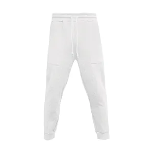 Vista detallada de la textura de punto jacquard blanco en pantalones de chándal hombre.