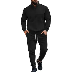 Full view of black men's jacquard tracksuit set with quarter-zip and joggers