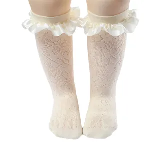 Elegant white lace knee-high socks for girls with satin ruffle trim for princess outfits