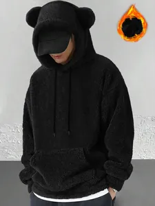 Cozy oversized black coral fleece men's hoodie featuring cute bear ears on the hood.