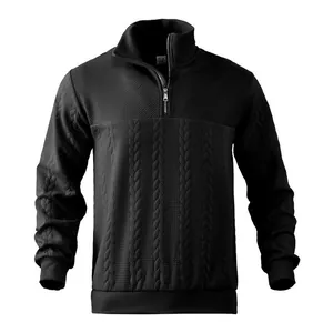 Detail view of mens black textured quarter-zip pullover with cable knit patterns