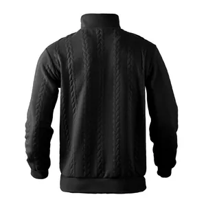 Detailed back view of mens black jacket showing thick cable-knit jacquard texture.