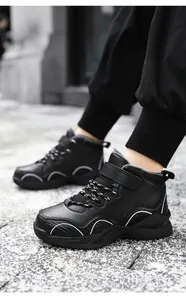 Close-up of boys' warm winter basketball shoes with fleece lining and Velcro