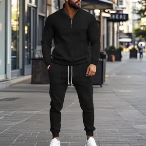 Conjunto de sudadera y joggers de jacquard negro para hombre estilo callejero