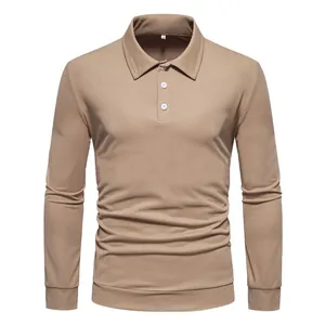 Front view detail of a khaki men's long-sleeve polo shirt with three white buttons