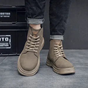 Detail view of retro high-top men's Martin boots in khaki work style with thick soles