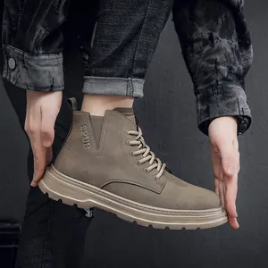 Close-up of vintage brown high-top Martin boots with durable thick soles and laces