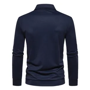 Back view of a navy blue long-sleeved men's polo shirt with casual fit and ribbed cuffs.