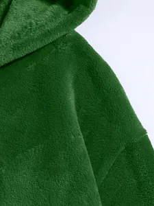 Close-up of the soft green coral fleece texture on a men's hooded casual jacket