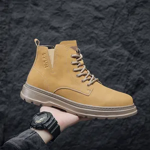 Side view detail of rugged tan Martin boot showing texture and thick rubber sole