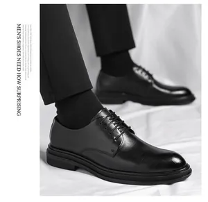 Macro detail of elegant black leather business shoes for men in a classic dress style