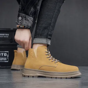 Detail view of yellow vintage Martin boots with thick soles and outdoor work style