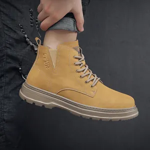 Close-up of yellow high-top men's Martin boots with thick soles and side texture