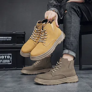 Close-up of retro high-top men's Martin boots in yellow and brown with thick soles
