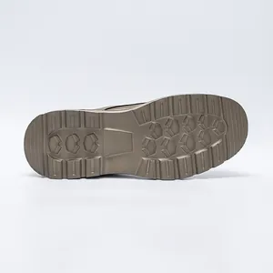 Detail macro view of the durable slip-resistant rubber sole for vintage outdoor work boots